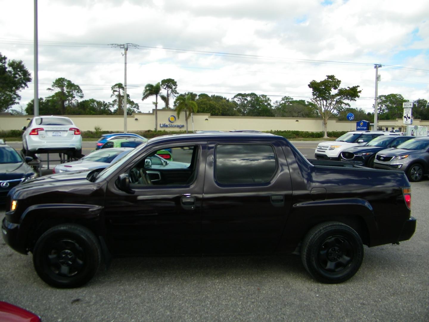 2007 Maroon /Grey Honda Ridgeline RT (2HJYK16267H) with an 3.5L V6 SOHC 24V engine, 5-Speed Automatic Overdrive transmission, located at 4000 Bee Ridge Road, Sarasota, FL, 34233, (941) 926-0300, 27.298664, -82.489151 - Photo#2